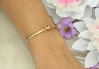 Stylowa bransoletka damska Nomination Italy Milleluci z zawieszką w kształcie korony 028018 039. Stal szlachetna platerowana złotem, wysadzana cyrkoniami, regulowana długość 14–19 cm. Idealny prez (3).jpg